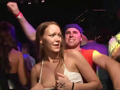 Randy models in the club partying and kissing while showing tits