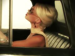 Blonde Jesse Jane blows and rides a tasty cock in a car fucking scene