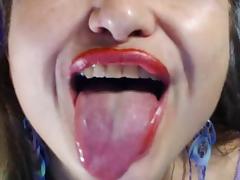 Tongues videos. Kneel on the floor while your girlfriend stands and tease her clit with your tongue