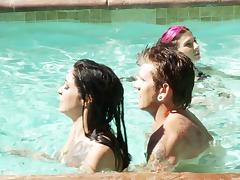 Two girls and a guy have some hardcore fun in the pool