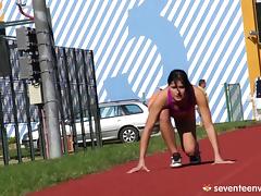 A hot track star finishes her workout by fucking her hairy pussy