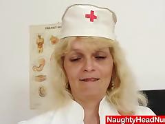 Mature nurse with a very hairy pussy fucks her big dildo