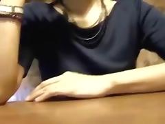 Crazy asian girl, wearing no panties, gives her man a blowjob, while dining in a restaurant.