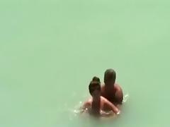 A voyeur tapes 2 couples having sex at a nude beach