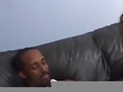Black guy fucks sexy brunette on sofa