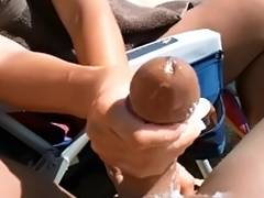 Compliation of Beach tugjob and large cumshots