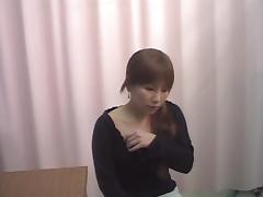 Asian schoolgirl stretches legs in the gyno office