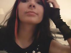 Emo girl with pierced nipples gets naked on webcam