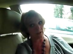 Mature wife gives good suck to man on car